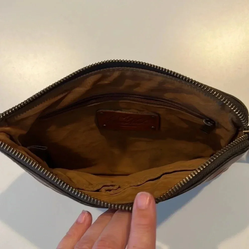Patricia Nash Cassini Wristlet with tooled floral pattern in Florence Brown